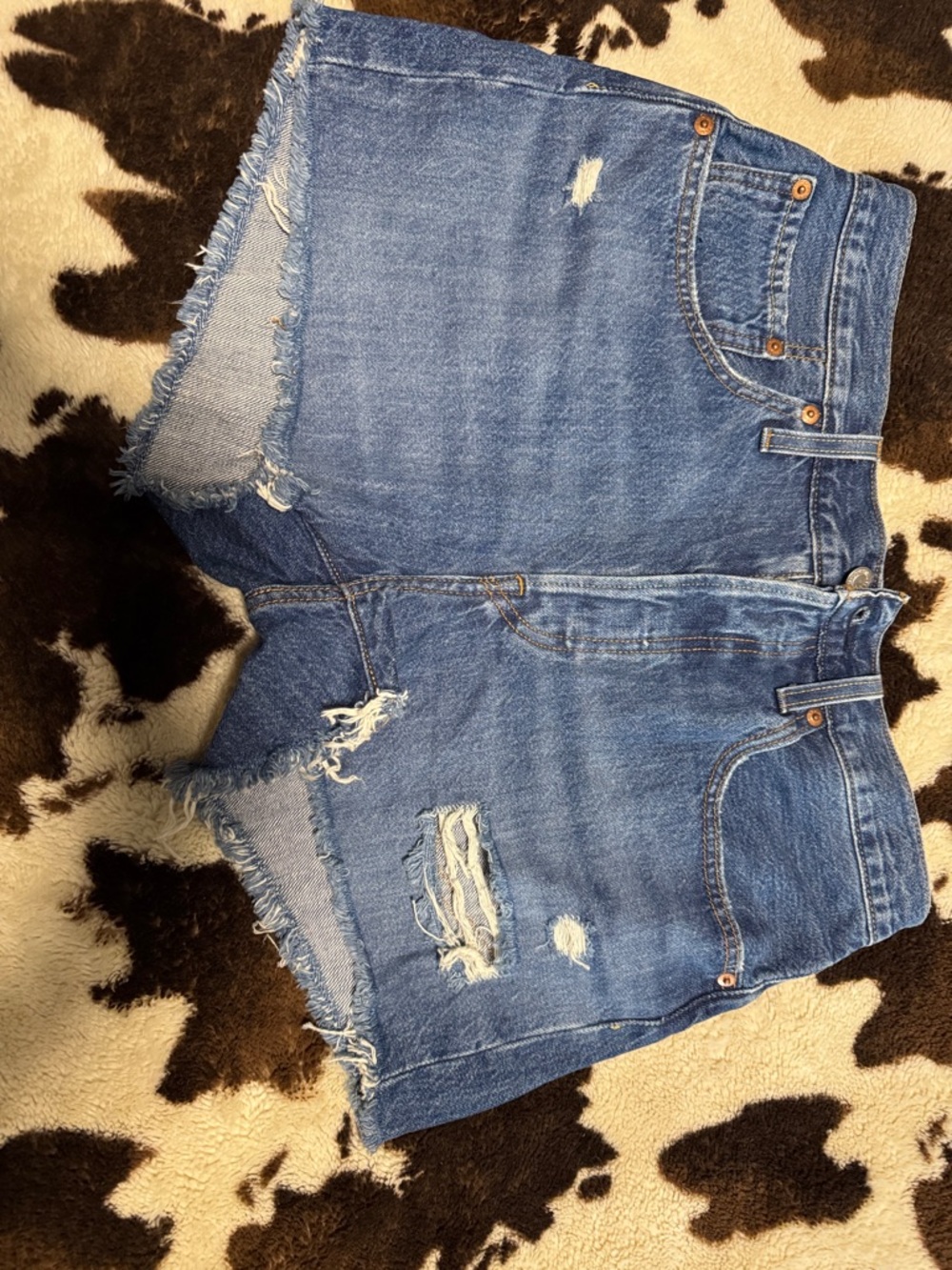 Levi's Medium Blue Distressed Cutoff Denim Shorts